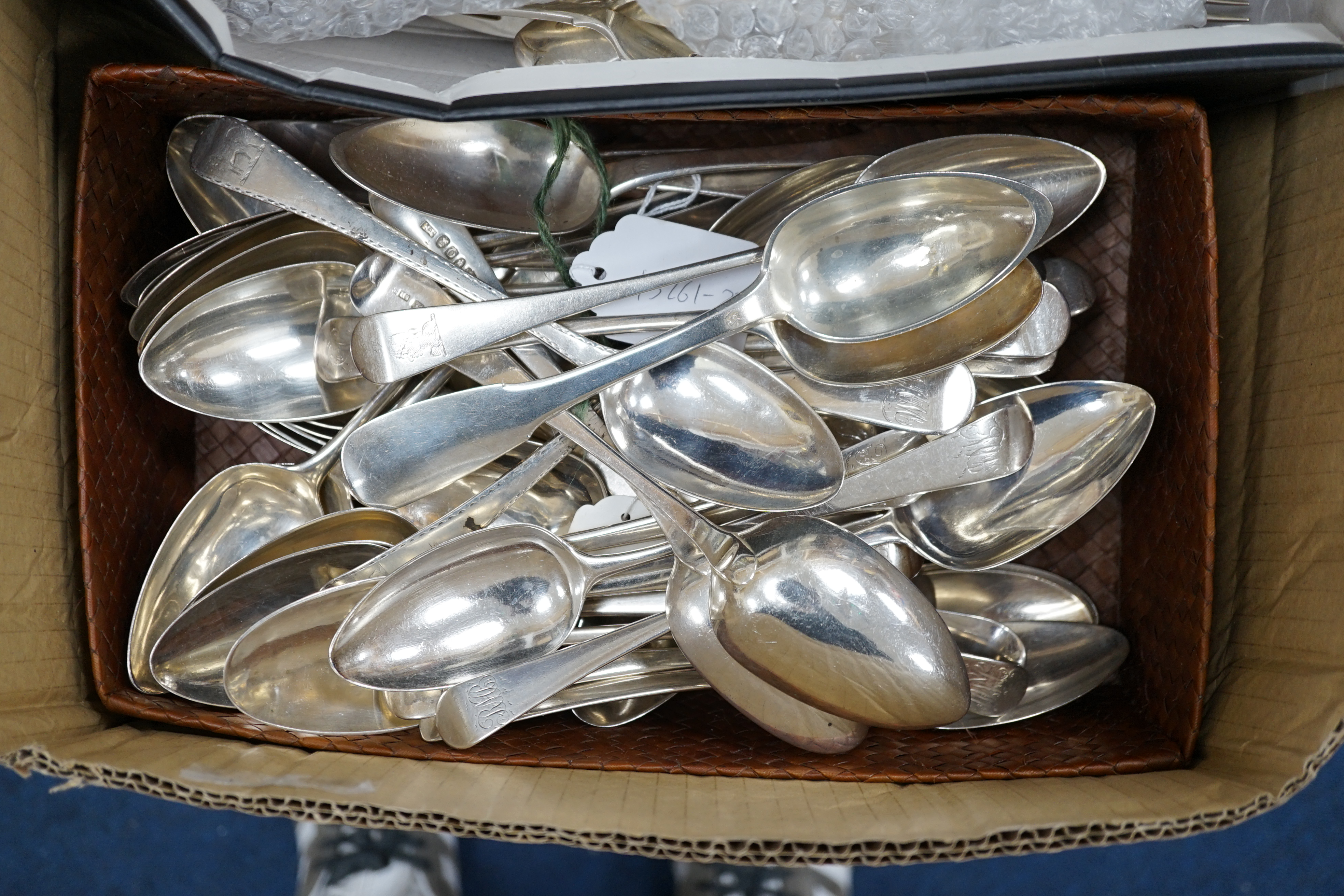 A harlequin collection of 18th and mainly 19th century silver Old English pattern table spoons, various dates and makers, forty five items, together with five similar fiddle pattern table spoons and two French white meta